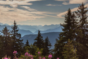 Standing on the Semnoz above the town of Annecy in France,  looking at the ranges of mountains