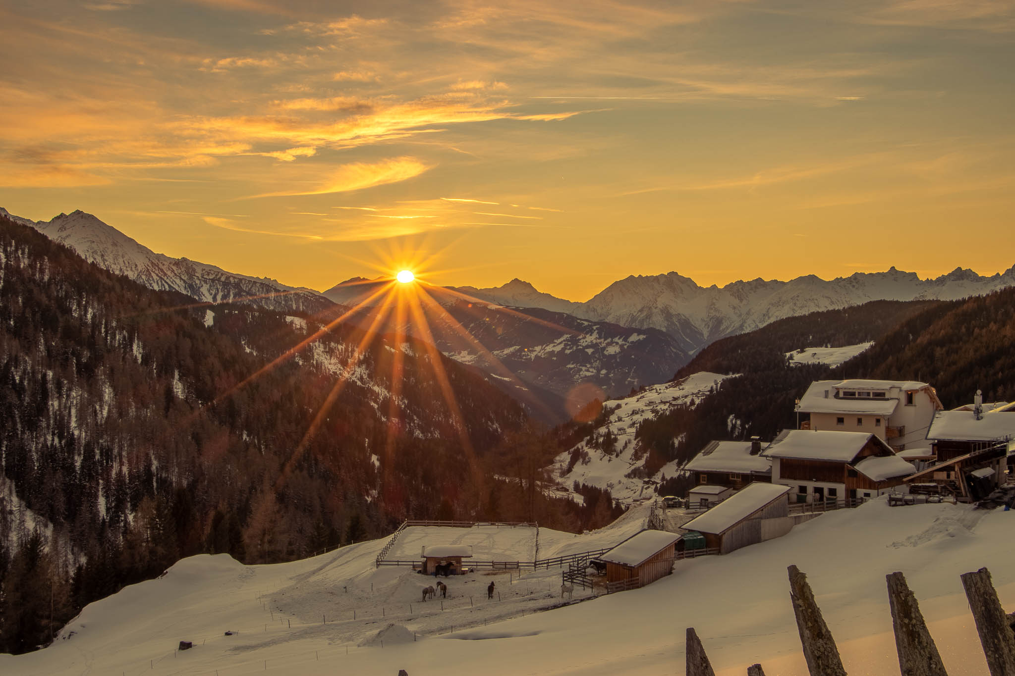 Sunset, snow,  ranges of mountains, and everything being perfectly quiet... such a serene moment!